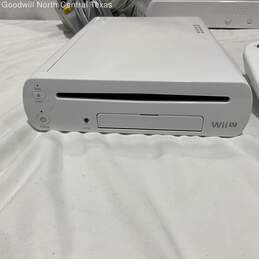 used Wii game console alternative image