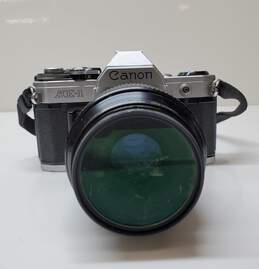 Canon AE-1 35mm SLR Film Camera with Canon 100 mm 1:1.4 Lens For Parts