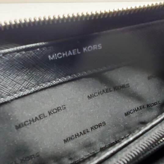 Buy the Michael Kors Black Leather Zip Around Long Wallet | GoodwillFinds