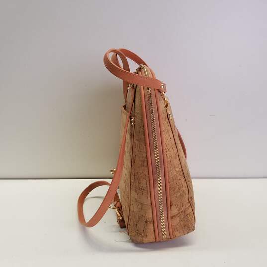 Convertible shoulder bag/backpack by Miztique. Tan.