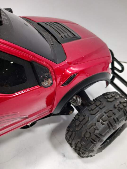 Red & Black Toy Ford Raptor Truck image number 6