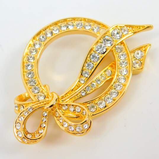 Vintage Nolan Miller Open Circle Bow Rhinestone Gold Tone Brooches 32.9g image number 2