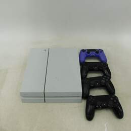 Sony PS4 w/ 4 Controllers