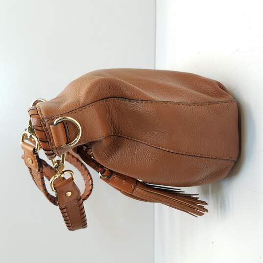 Buy the Michael Kors Women's Bennett Brown Leather Whipstitch Tassel  Shoulder Bag | GoodwillFinds
