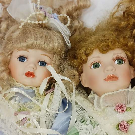 Pair of Seymour Mann Porcelain Dolls image number 3