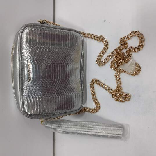 Victorias Secret Purse Silver with a Gold Chain Strap & Large Tassle