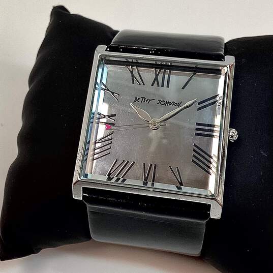 Designer Betsey Johnson Black Leather Strap Rectangle Analog Quartz Wristwatch image number 1