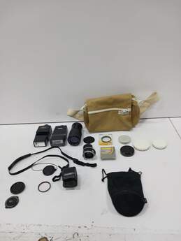 Bundle of Assorted Camera Accessories In Bag