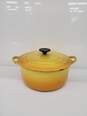 Vintage Le Creuset 4.5 qt Yellow Tangerine Enameled Cast Iron Dutch Oven used image number 1