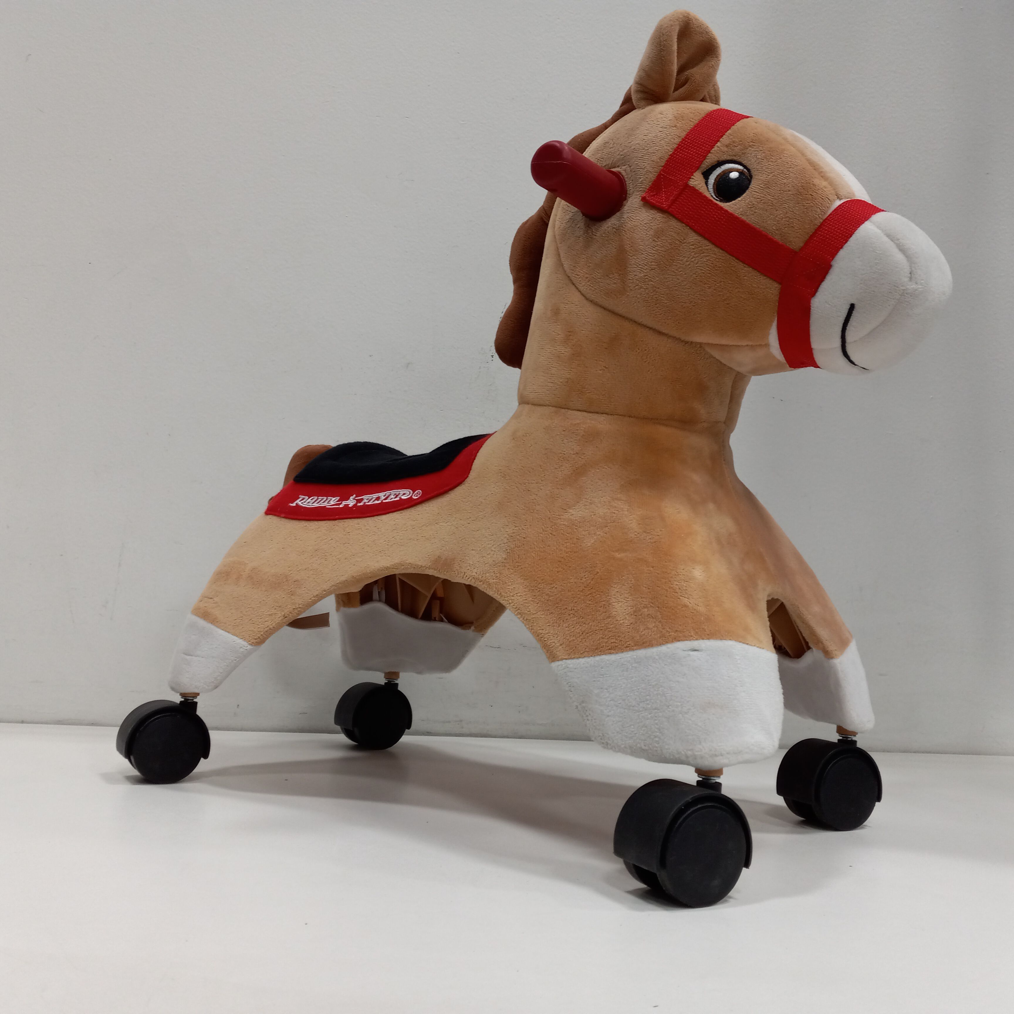 Buy the Toddler's Radio Flyer Rolling Ride-On Pony Horse Riding