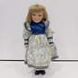 Collectible Porcelain Doll w/ Stand image number 1