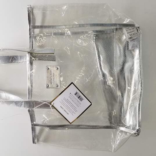 Buy the Michael Kors Clear Silver Tote Bag | GoodwillFinds