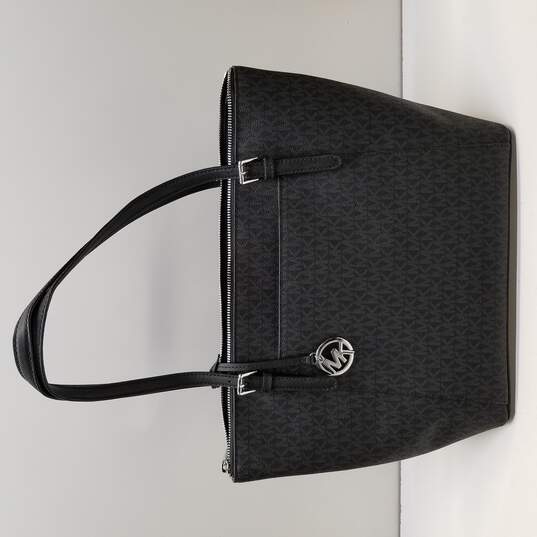 Buy the Michael Kors Ciara Large EW Top Zip Signature Coated Canvas Tote Bag  | GoodwillFinds