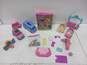 Polly Pocket Lot of Assorted Dolls, Vehicles, & Accessories image number 1