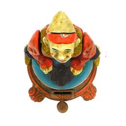 Vintage Repro Cast Iron Spinning Hand Stand Clown On Globe Mechanical Coin Bank alternative image