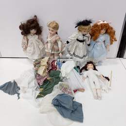 Bundle of Assorted Porcelain Dolls w/ Accessories