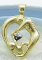 Romantic 10k Yellow Gold Mother Figural Diamond Accent Pendant 1.9g image number 1