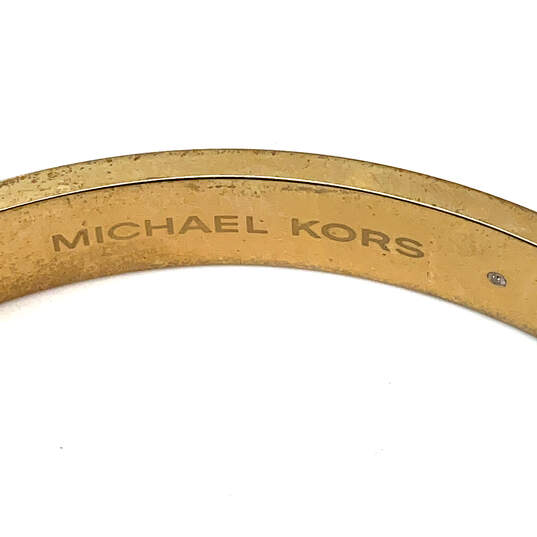 Designer Michael Kors Gold-Tone Rhinestone Hinged Round Bangle Bracelet image number 4