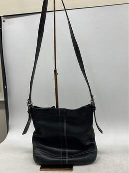 Coach Black Leather Crossbody Bag W/ Adjustable Strap & Spacious Interior"