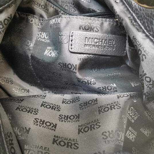 Michael Kors black handbag, Brand Vision