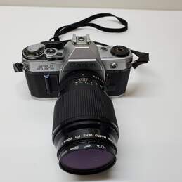 Canon AE-1 35mm SLR Film Camera with Canon 100 mm 1:1.4 Lens For Parts alternative image
