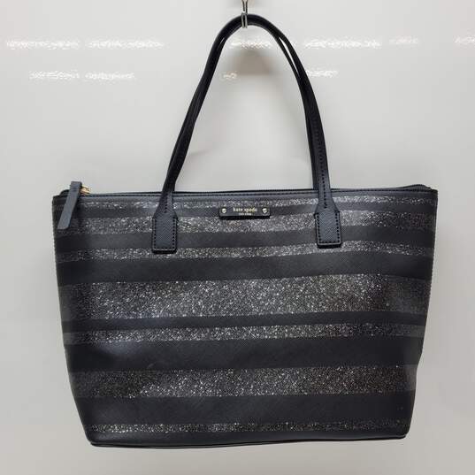 Buy the Kate Spade Black Shimmer Stripe Tote Bag | GoodwillFinds