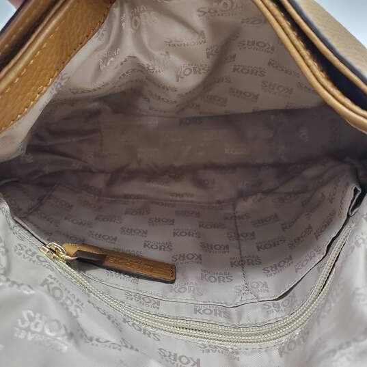 Buy the Michael Kors Bedford Tassel Medium Pebbled Leather Convertible Flap  Crossbody Shoulder Bag Brown Leather Purse