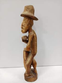 Carved Folk Art Farmer Wooden Sculpture alternative image