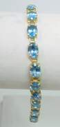 14K Yellow Gold Oval Blue Topaz Tennis Bracelet 8.5g image number 1
