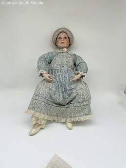 Grandma Sitting Down Porcelain Doll