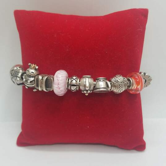 Sterling Silver 16-Charm Snake Roll 7.5" Bracelet 52.6g image number 1