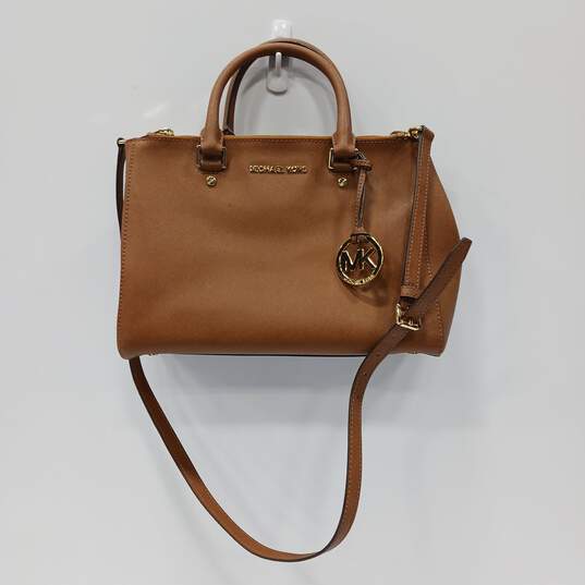 Michael Kors Brown Leather Tote Purse image number 1