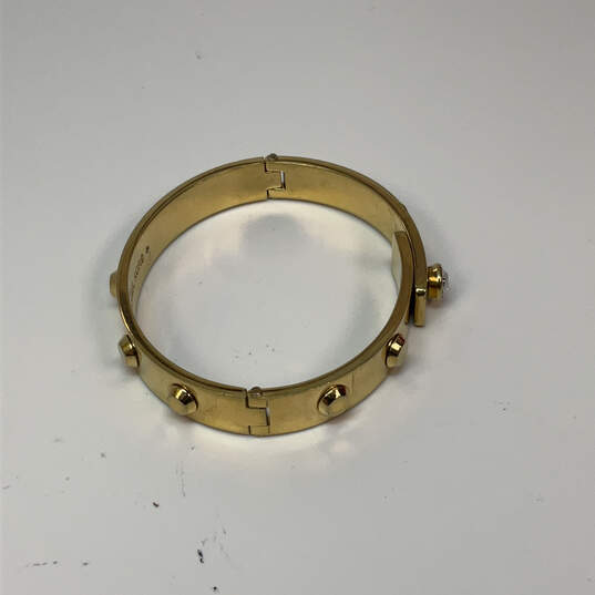 Designer Michael Kors Gold-Tone Fashionable Studded Hinged Bangle Bracelet image number 3