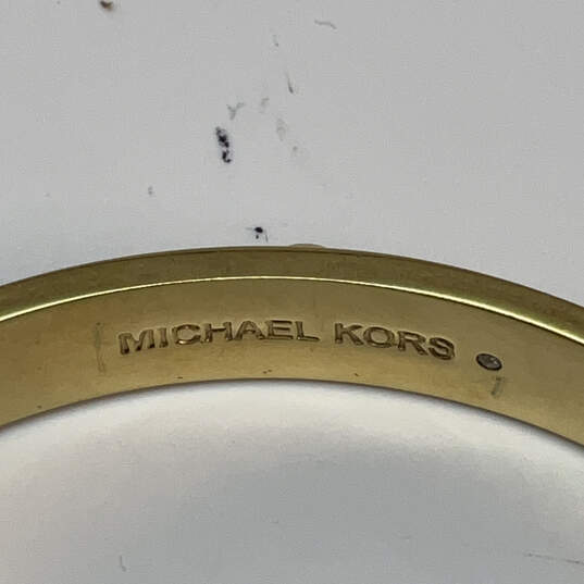 Designer Michael Kors Gold-Tone Fashionable Studded Hinged Bangle Bracelet image number 4