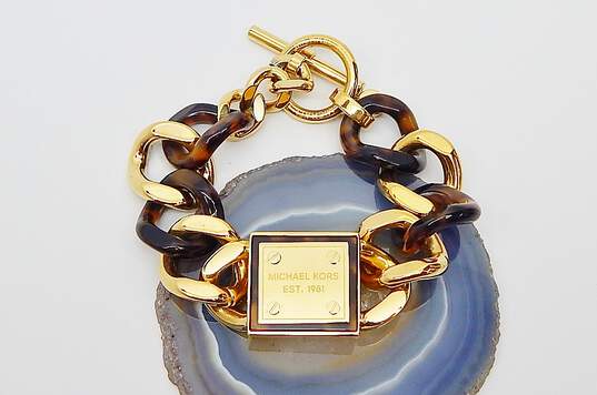 Buy the Designer Michael Kors Chunky Gold Tone & Tortoise Curb Chain  Bracelet | GoodwillFinds