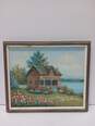 Framed Painting of Brick Cottage on Lake By M Daniels image number 1