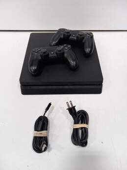 PS4 Console w/ Controllers & Cables