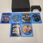 PlayStation 4 Console Bundle w/ 3 Games and Controller image number 2