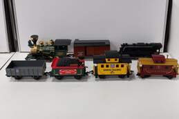 Bundle of 8 Assorted Lionel & Scientific Toys Trains