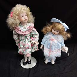 2 Vintage Porcelain Sad Girl Dolls with Stands