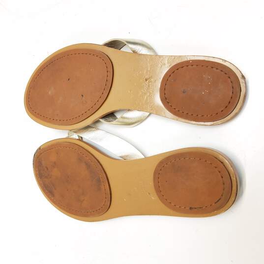 Buy the Tory Burch Women's Gold Leather Flip Flop Sandals Size  |  GoodwillFinds