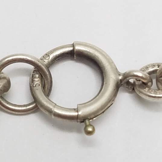 Sterling Silver Assorted Coin 8- Charm 7" Bracelet 68.1g image number 6