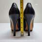 AUTHENTICATED WMNS COACH BLACK LEATHER TURNLOCK PUMPS SIZE 6 image number 5