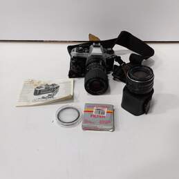 Nikon FG-20 1:2.8-4 f:35-70mm Camera with Accessories