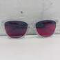 Clear Oakley Sunglasses Frames w/ Transparent Red Lenses image number 1