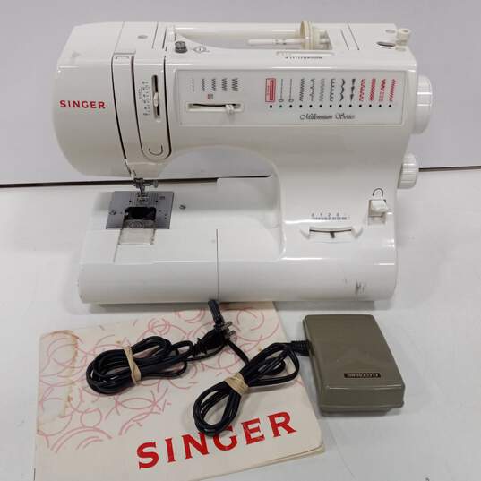 Singer 6412 Millennium Series Zig Zag Sewing Machine with Foot Pedal & Manual image number 1