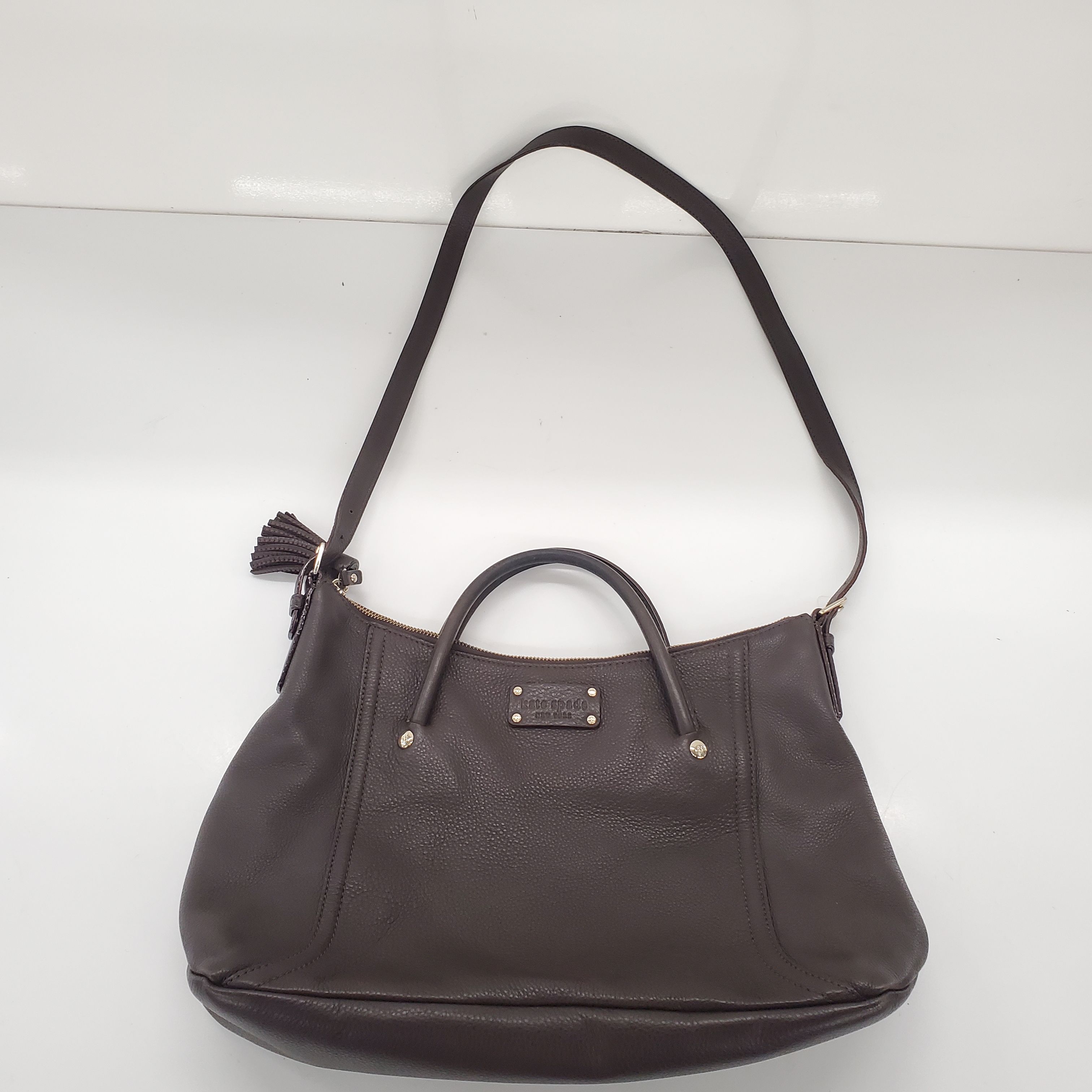 Buy the Kate Spade Dark Brown Leather Crossbody Bag | GoodwillFinds