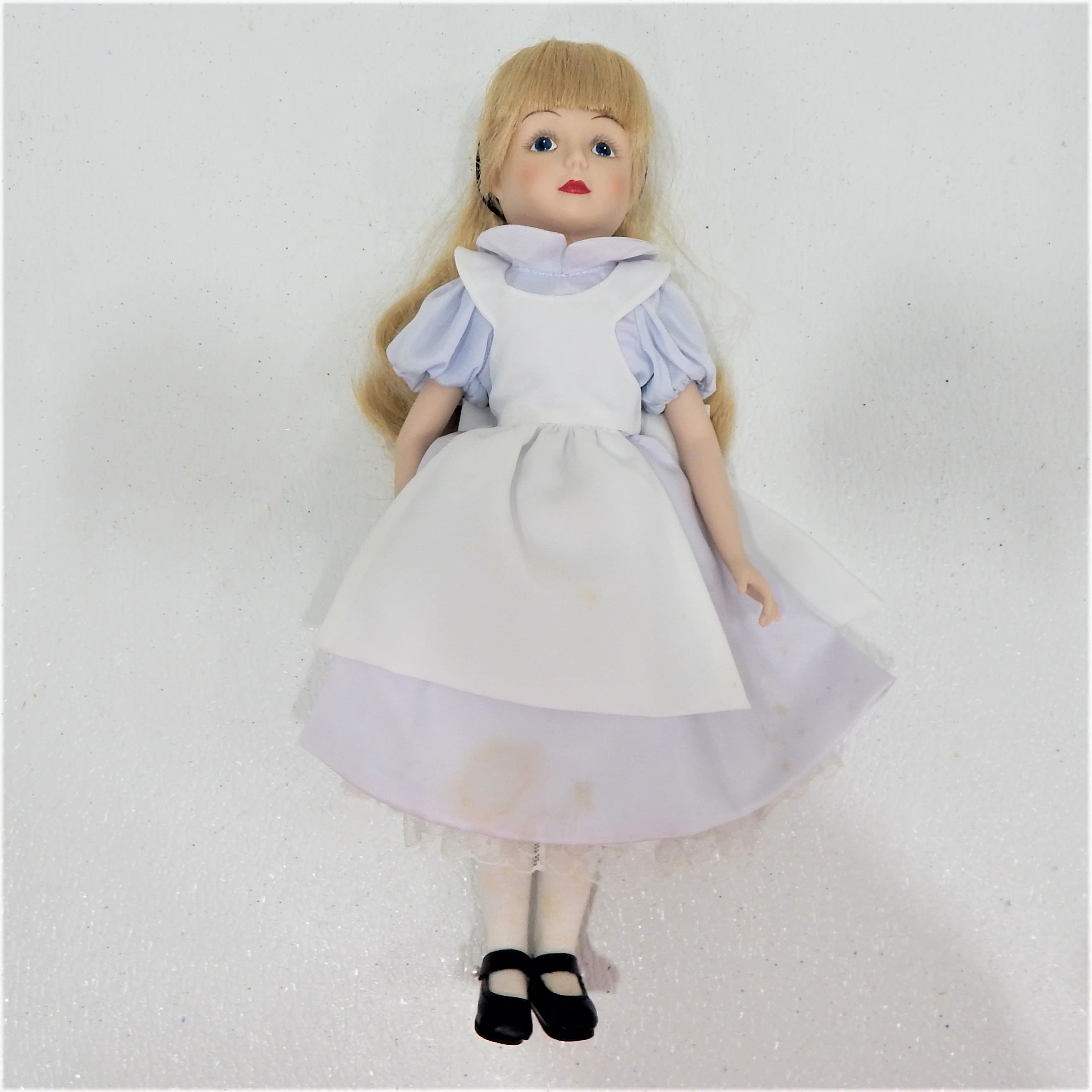 Buy the Vintage Disney Alice in Wonderland Porcelain Doll | GoodwillFinds