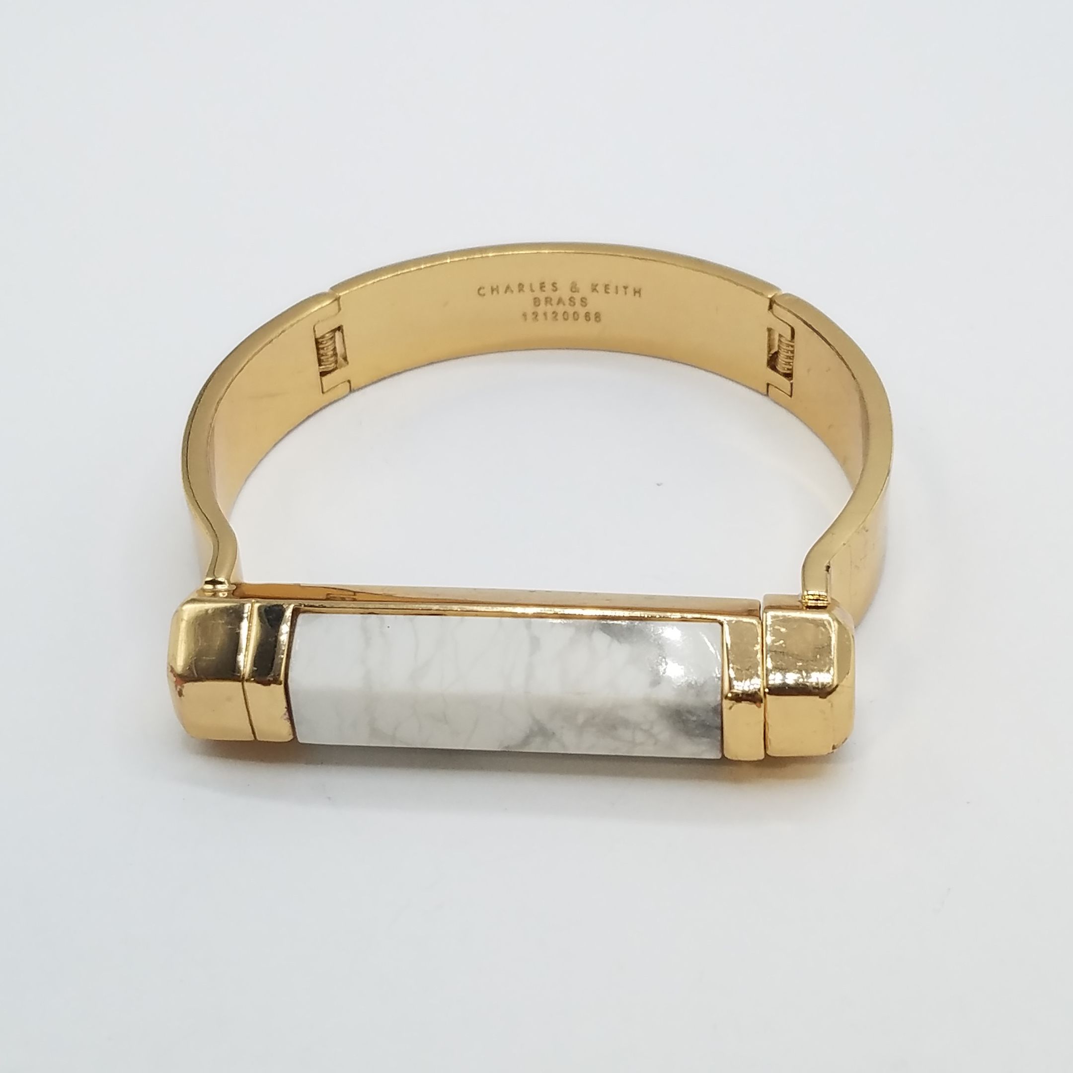 Buy Charles & Keith Gold Tone Marble Like Double Hinge Magnetic 7 In Bangle  Bracelet 73.3g for USD 37.99 | GoodwillFinds