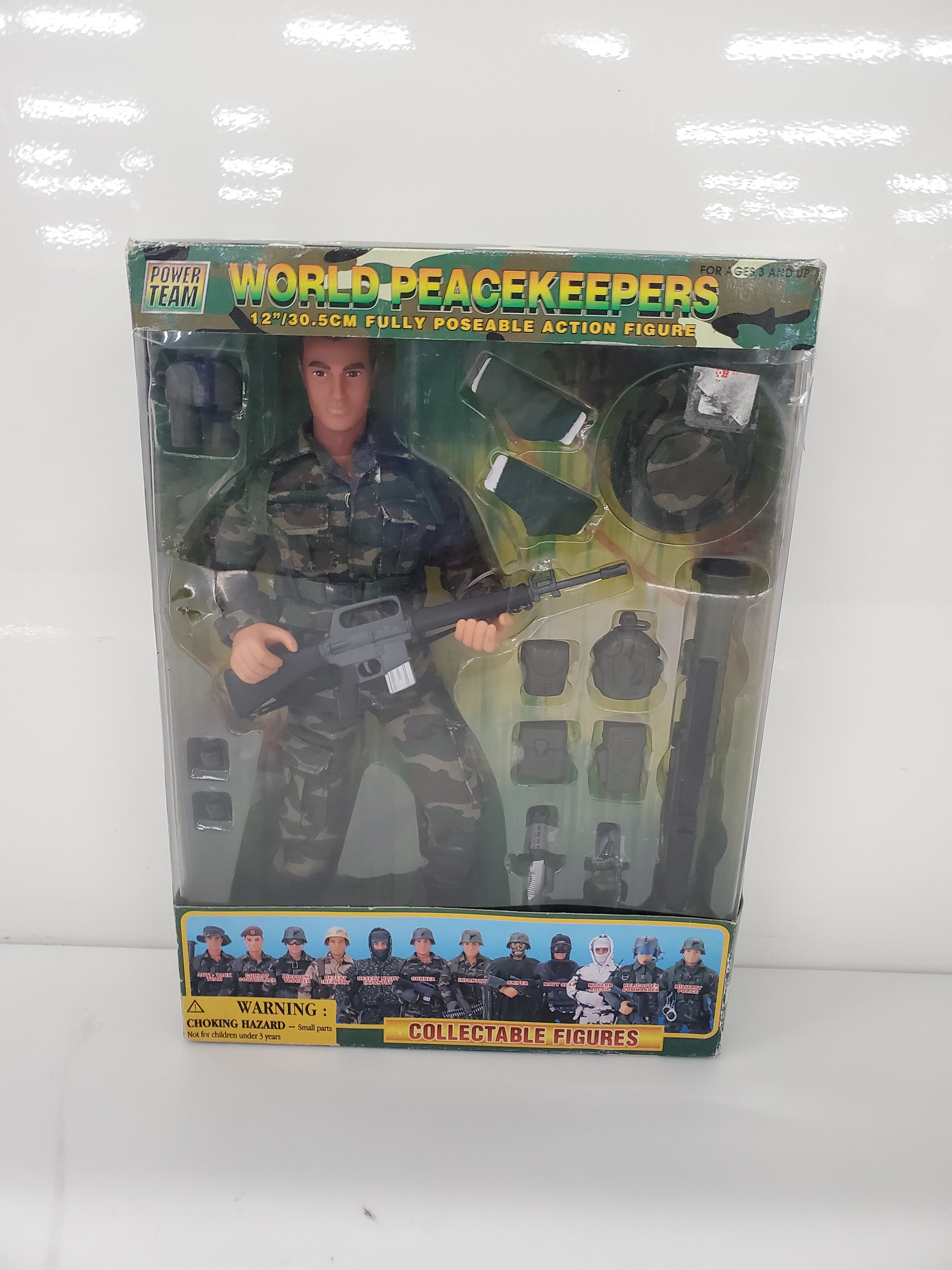 Buy the World Peacekeepers Power Elite Team Gunner | GoodwillFinds